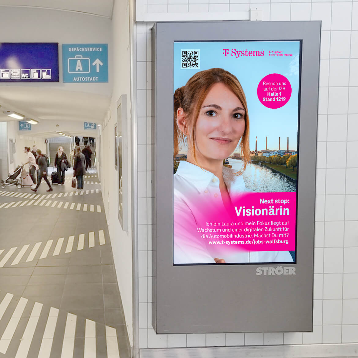 Hier ist eine Anziegengestaltung in einem Bahnhof in Wolfsburg von tikitay werbeagentur für die Wolfsburg Kampagne der T-Systems zu sehen.